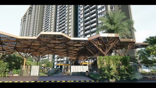 An expansive aerial view of the lush central park within Godrej Woodscapes.